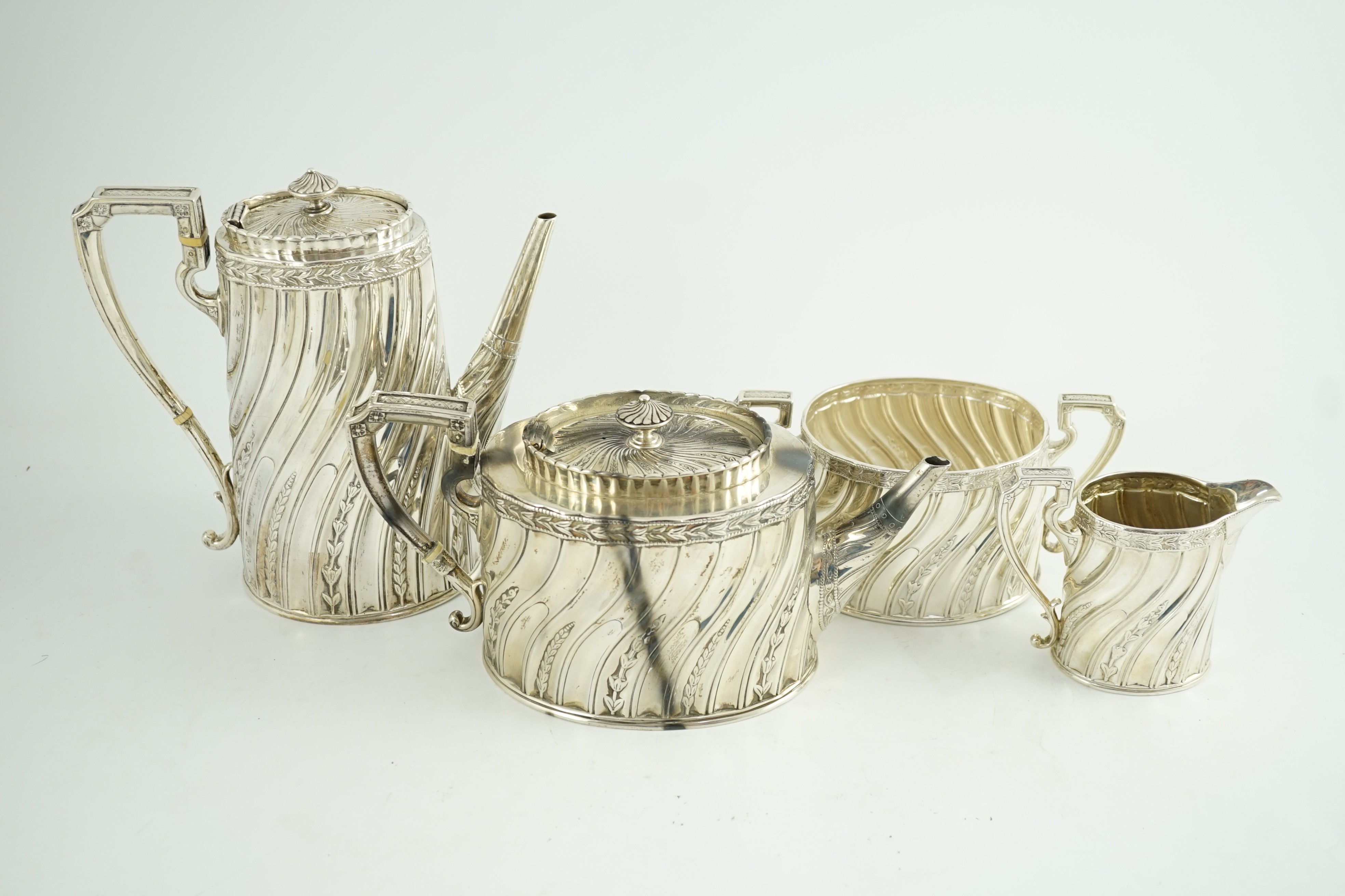 A late Victorian silver four tea and coffee service, by Walter & John Barnard